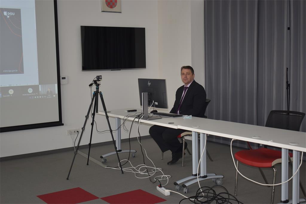 The picture shows Damir Šantek, PhD, director general of the State Geodetic Administration, during the opening of the 24th NSDI workshop, held in the form of a webinar