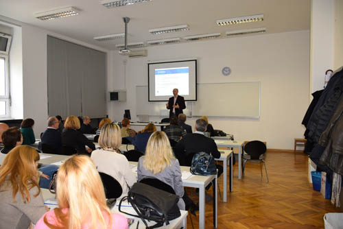 The picture shows the participants of the workshop during the presentation of T. Ciceli in the premises of the Faculty of Geodesy.